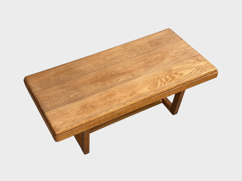 Rehomed 1950s solid oak coffee table or bench with trapezoid legs and natural grain.